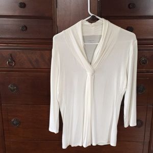 Slightly off white top-wear it with anything! Sz L